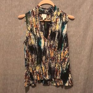 Julienne W | multi color peplum sleeveless blouse